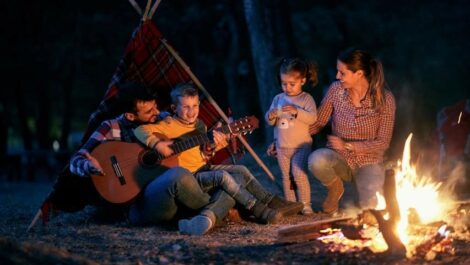 A family camping outdoors