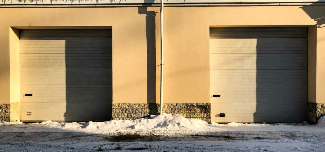 Outdoor storage units with snow on the ground