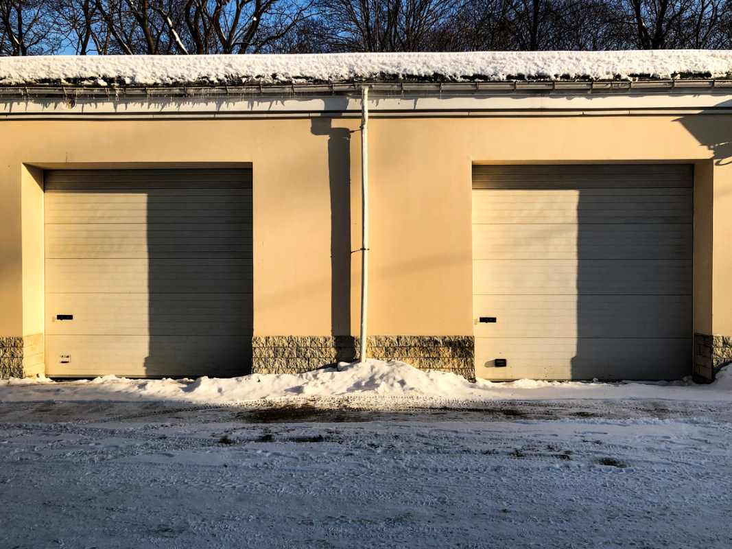 Outdoor storage units with snow on the ground